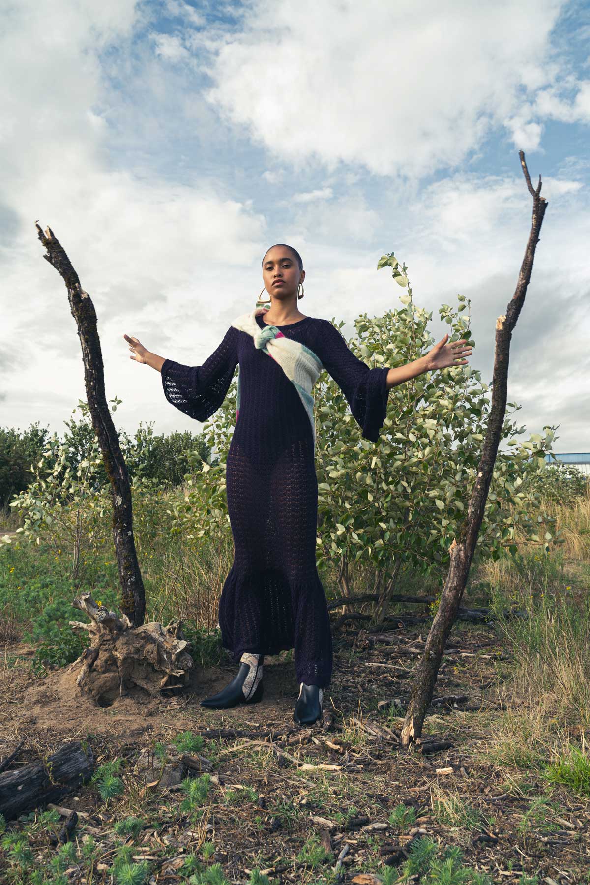 Model Standing In a Field