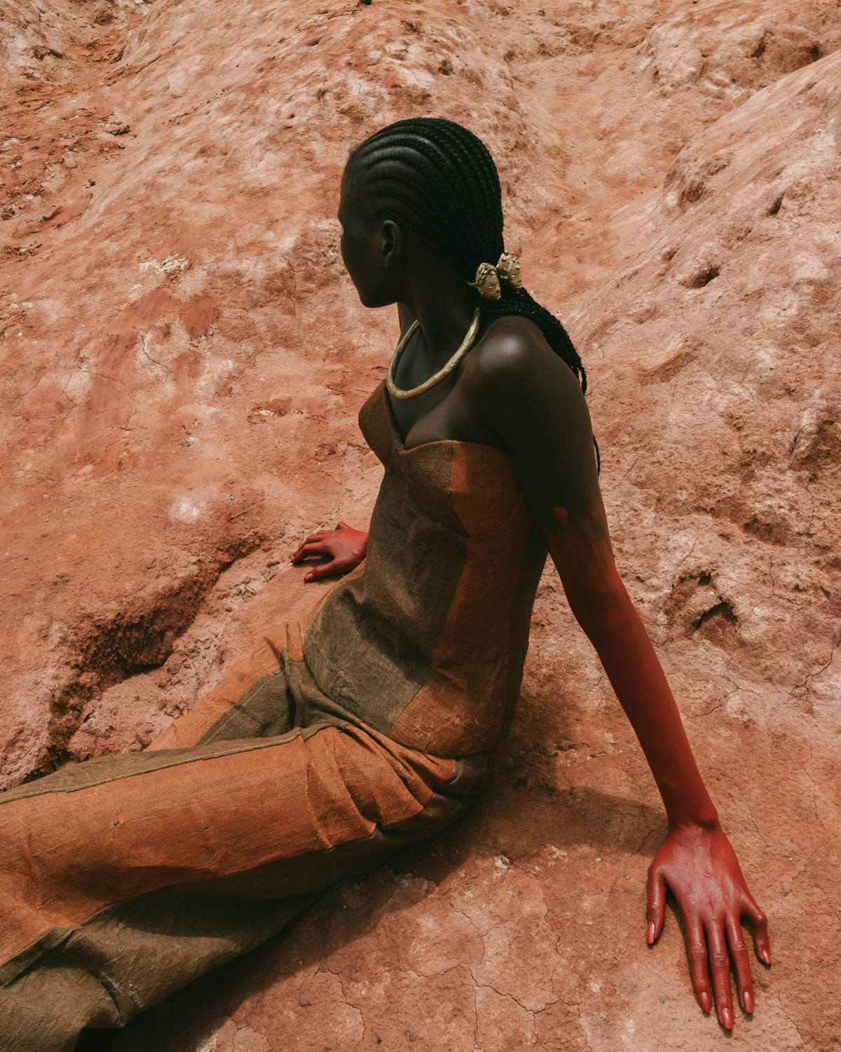 IAMISIGO, clay-dyed barkcloth dress, Shadows, Spring/Summer 2024. Photograph by Fred Odede. Courtesy of IAMISIGO.