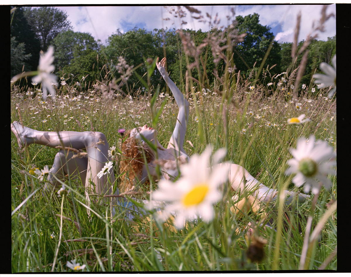 Woman with flowers, from the book Fallen Flowers