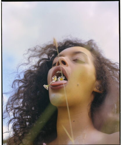Woman with flowers, from the book Fallen Flowers