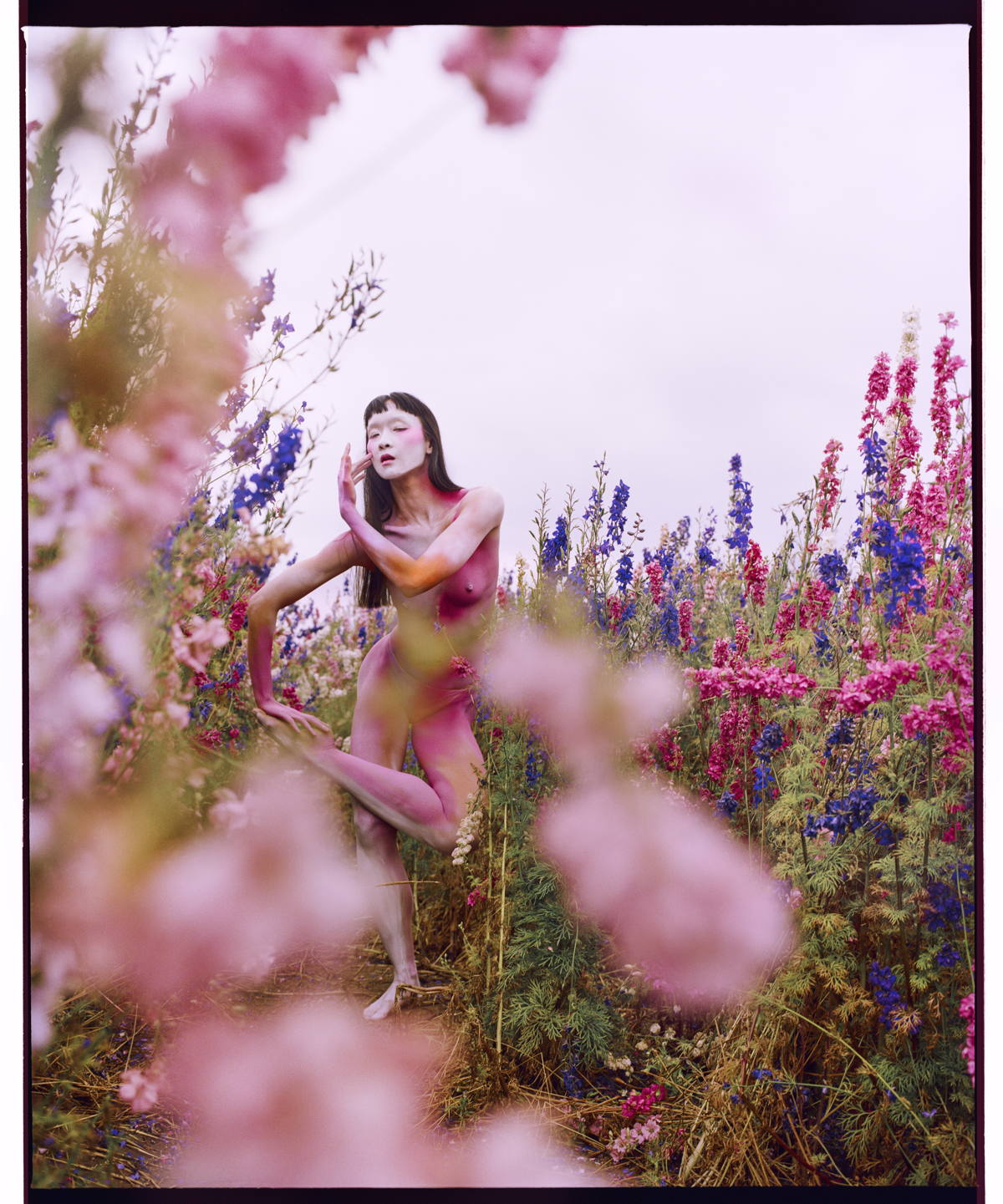 Woman with flowers, from the book Fallen Flowers