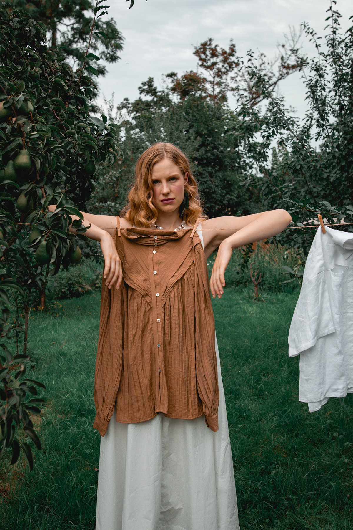 Model Posing Behind A Washing Line