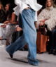 A model is catwalking Stella McCartney SS2026 show with Pure.Tech Jeans