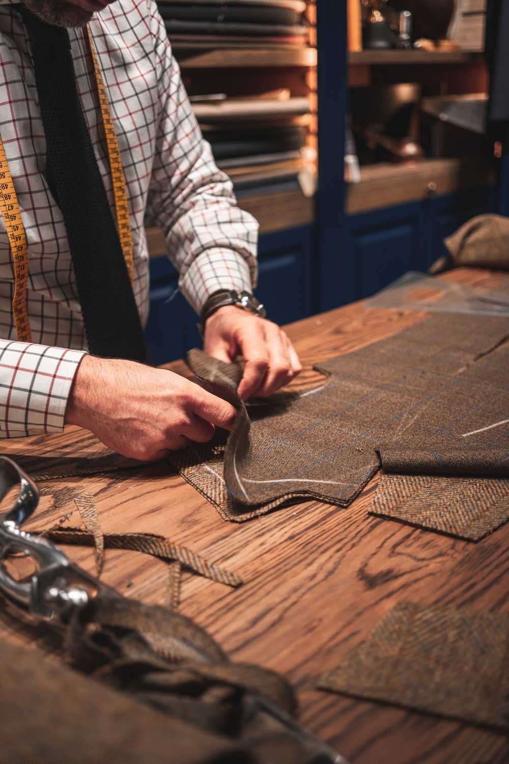 A Tailor Crafting A Garment