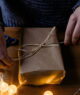 Hands unpacking a present