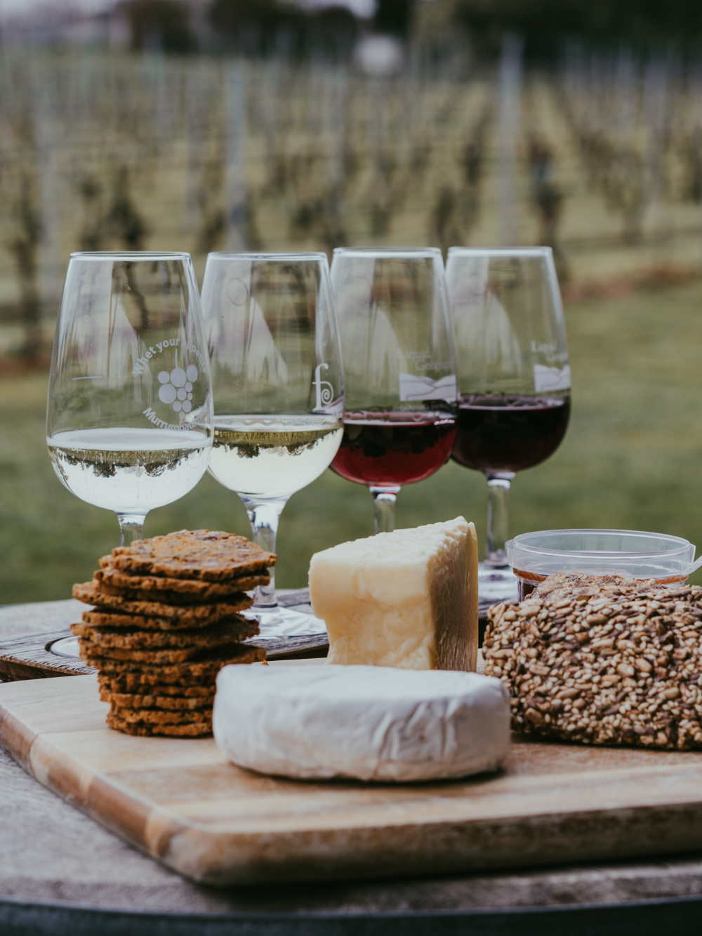 4 Wine Glasses With Cheese And Crackers